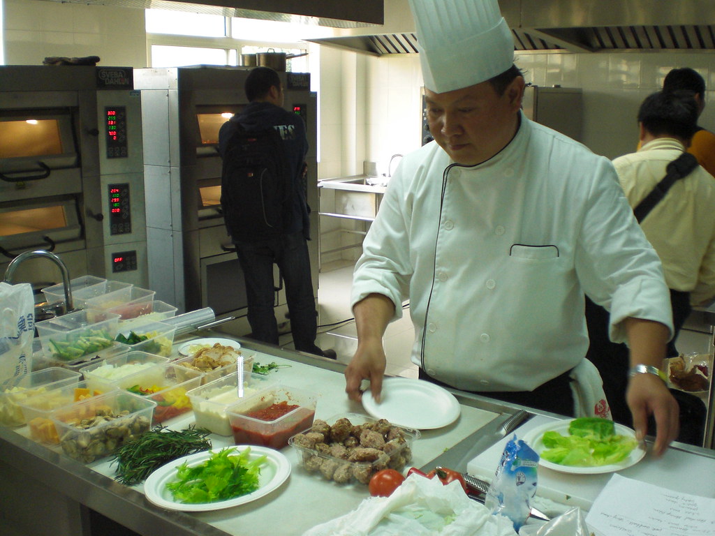 Professional pizza making demonstration